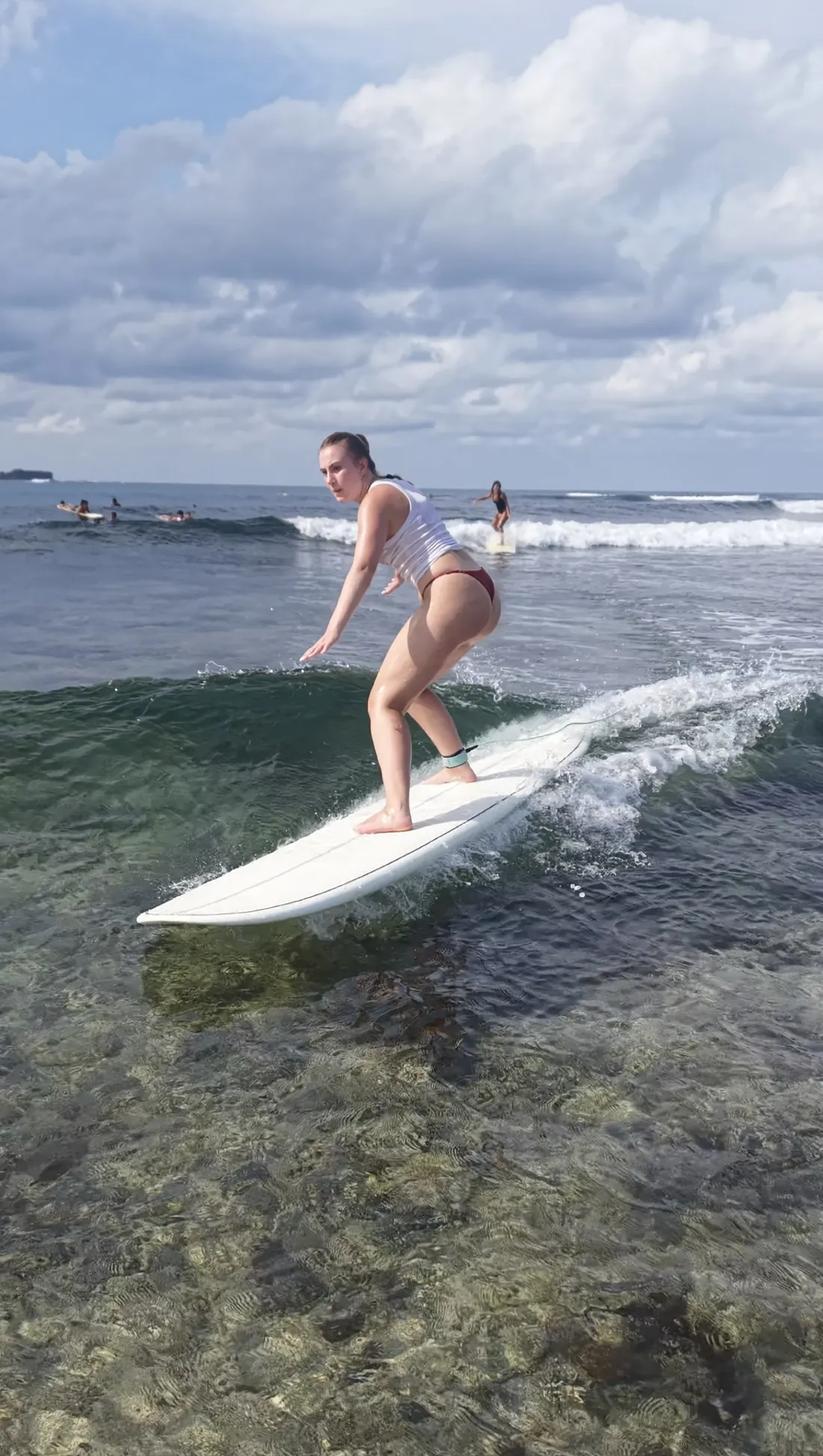 Student standing on her first wave