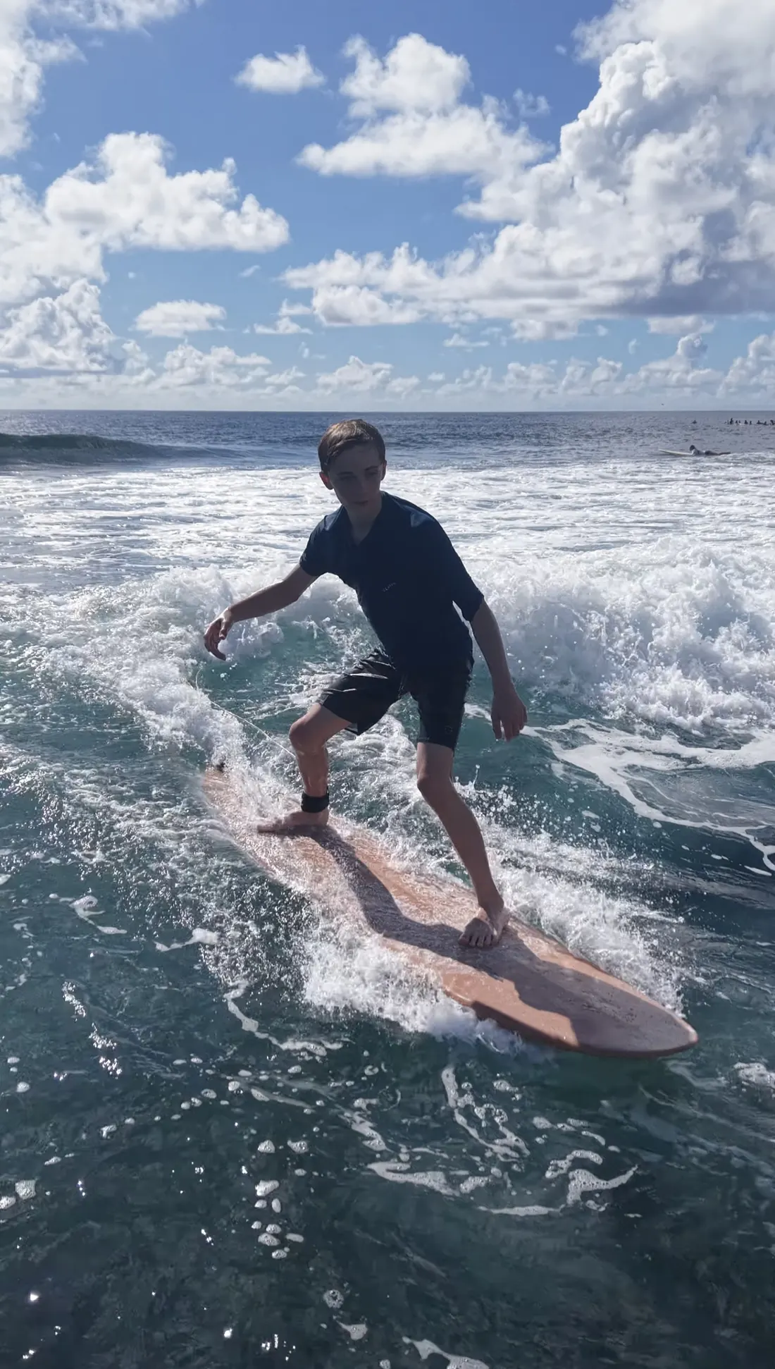 Surfer carving on a wooden board